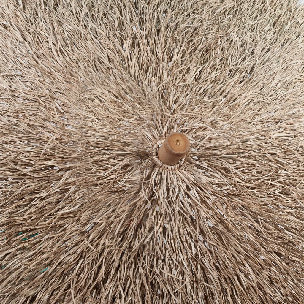 Parasol en bambou avec toit en feuille de bananier