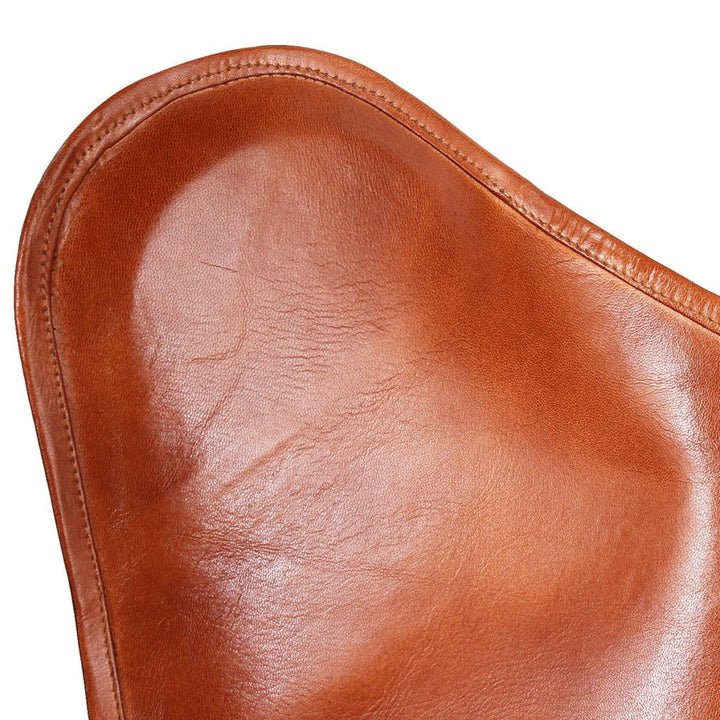 Fauteuil papillon en cuir